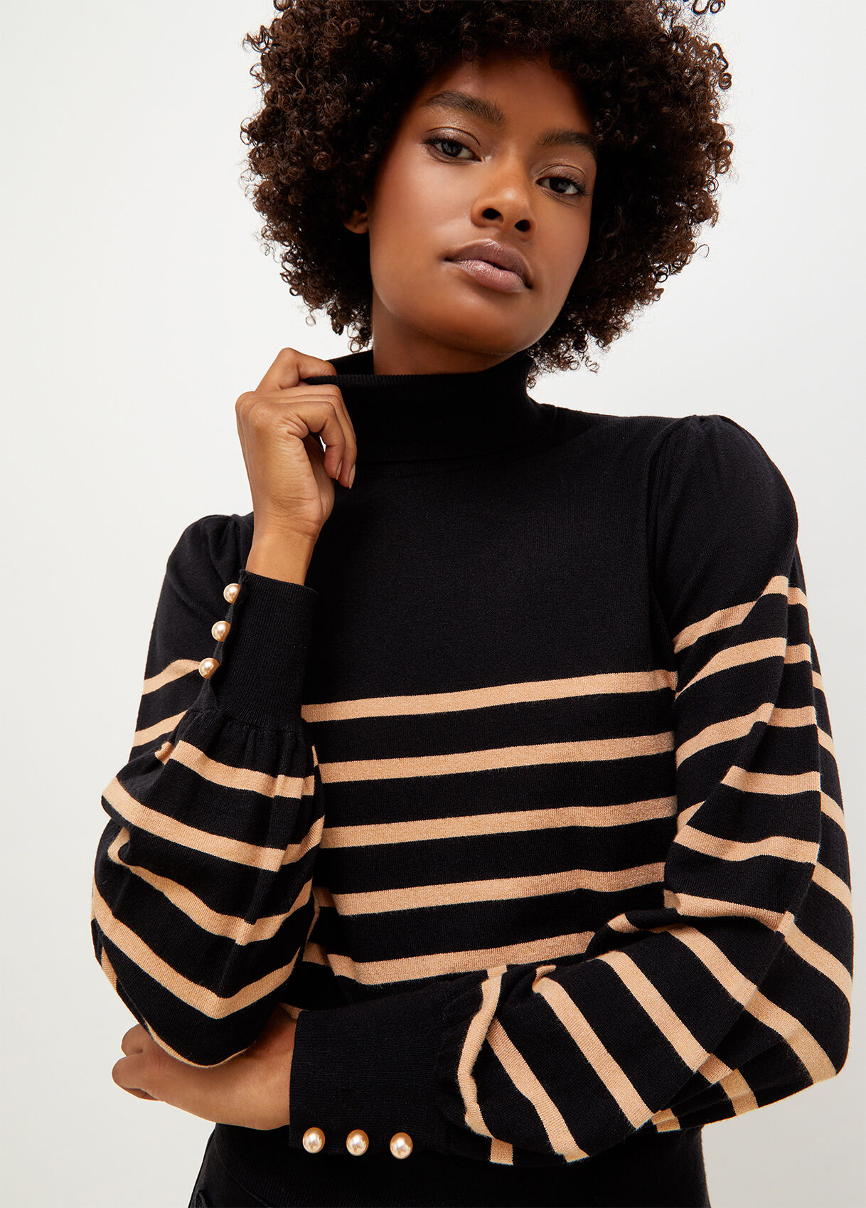 Striped turtleneck sweater with beads