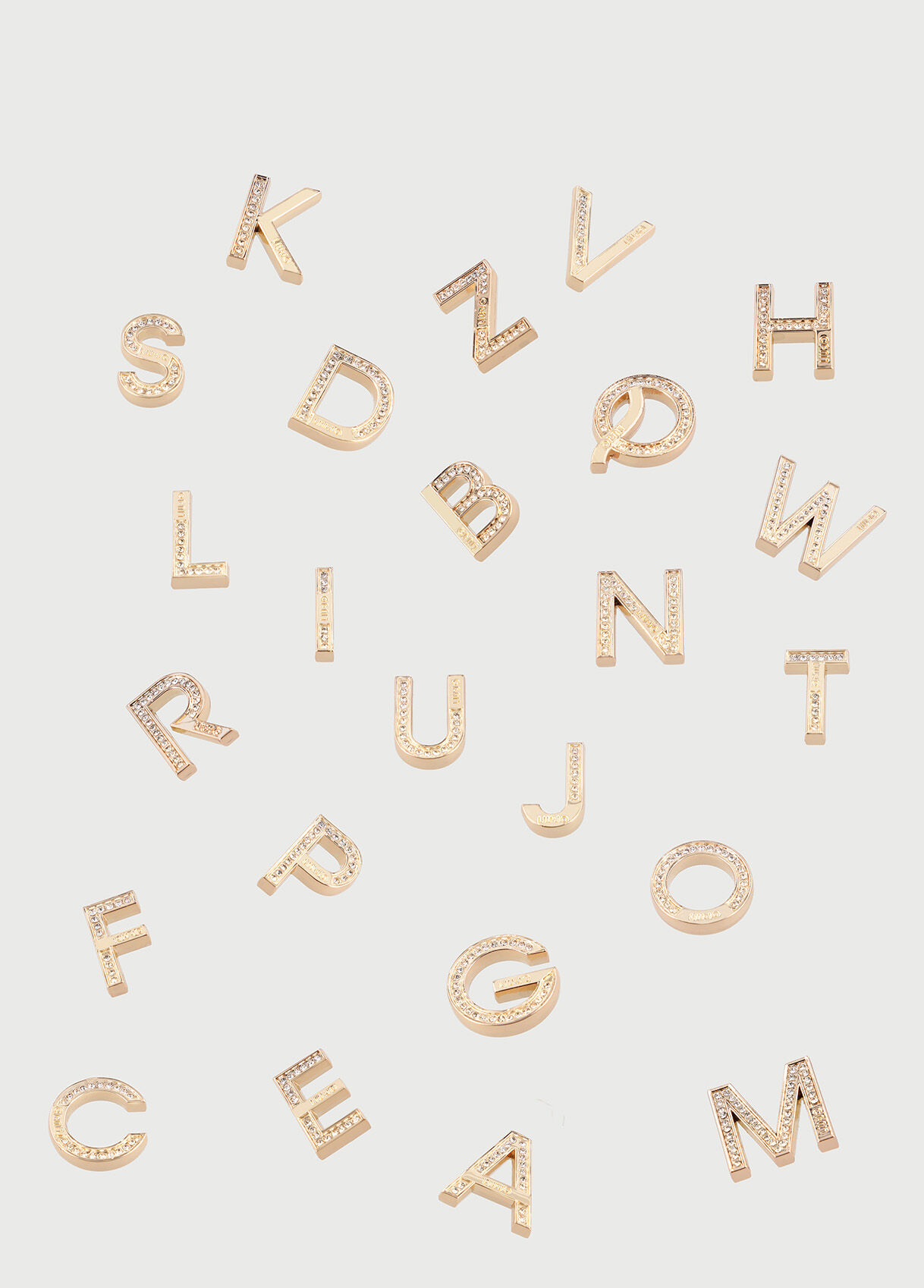 Metal letter with strass