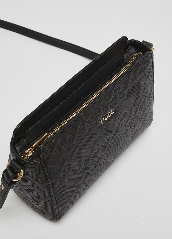Embossed monogram logo crossbody bag