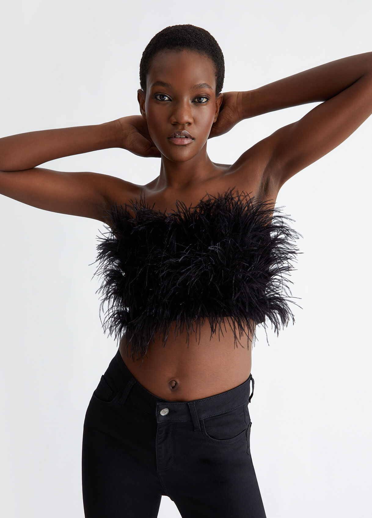 Magliette con piume new arrivals