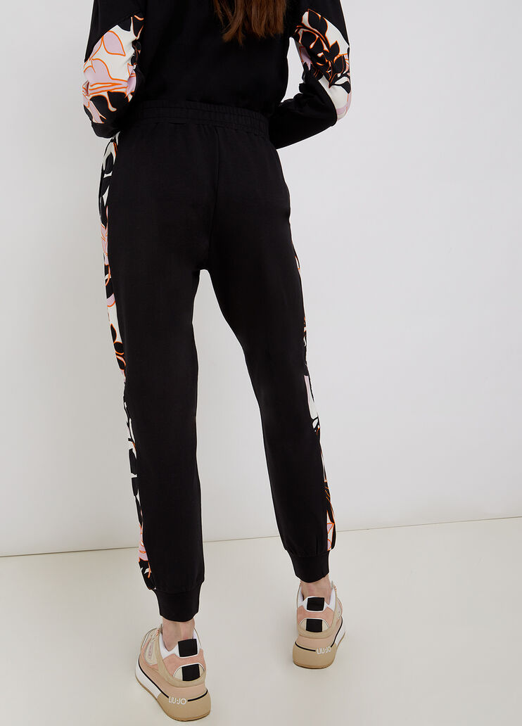 Jogginghose mit Galonstreifen Blumen Orange/Schwarz Liu Jo - large image number 1