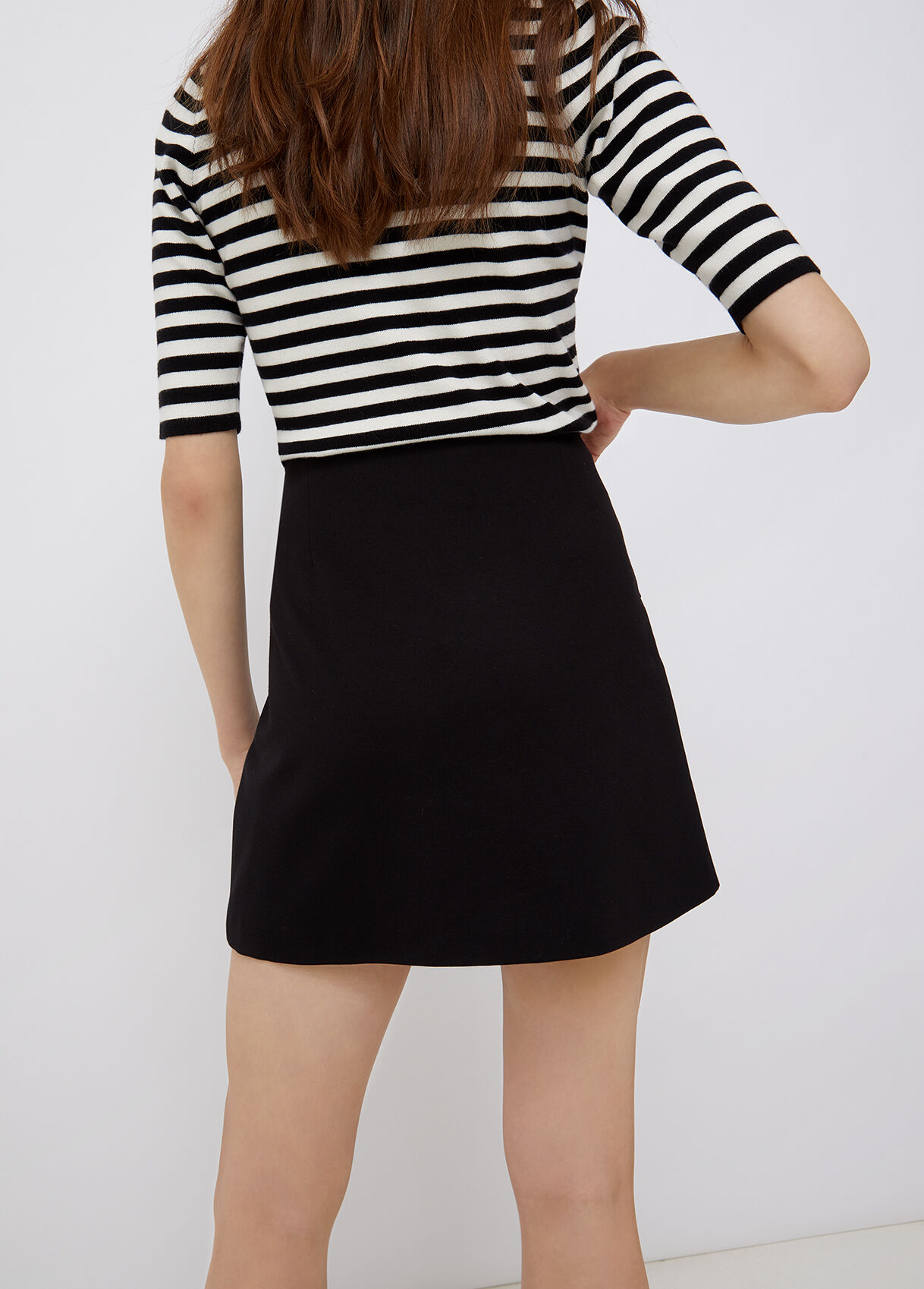 black mini skirt pockets