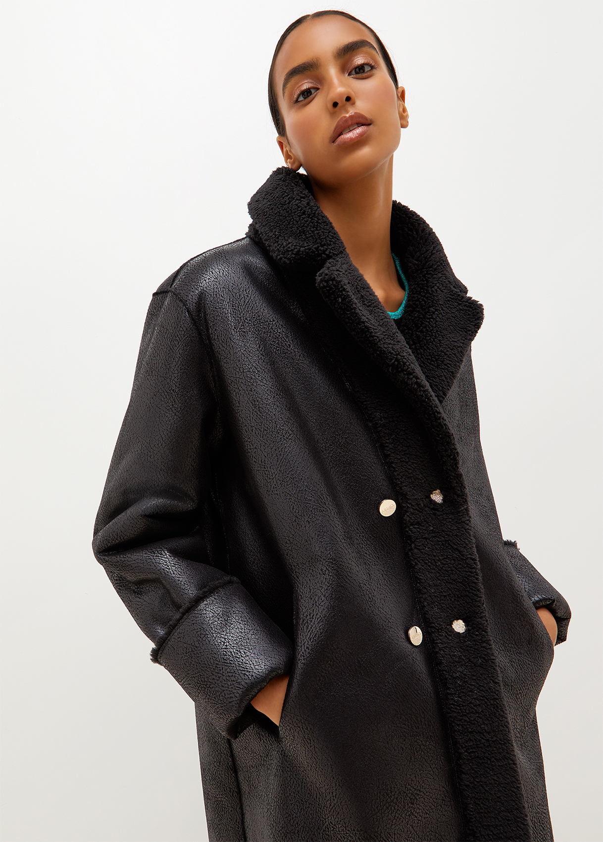 Reversible teddy and coated fabric coat