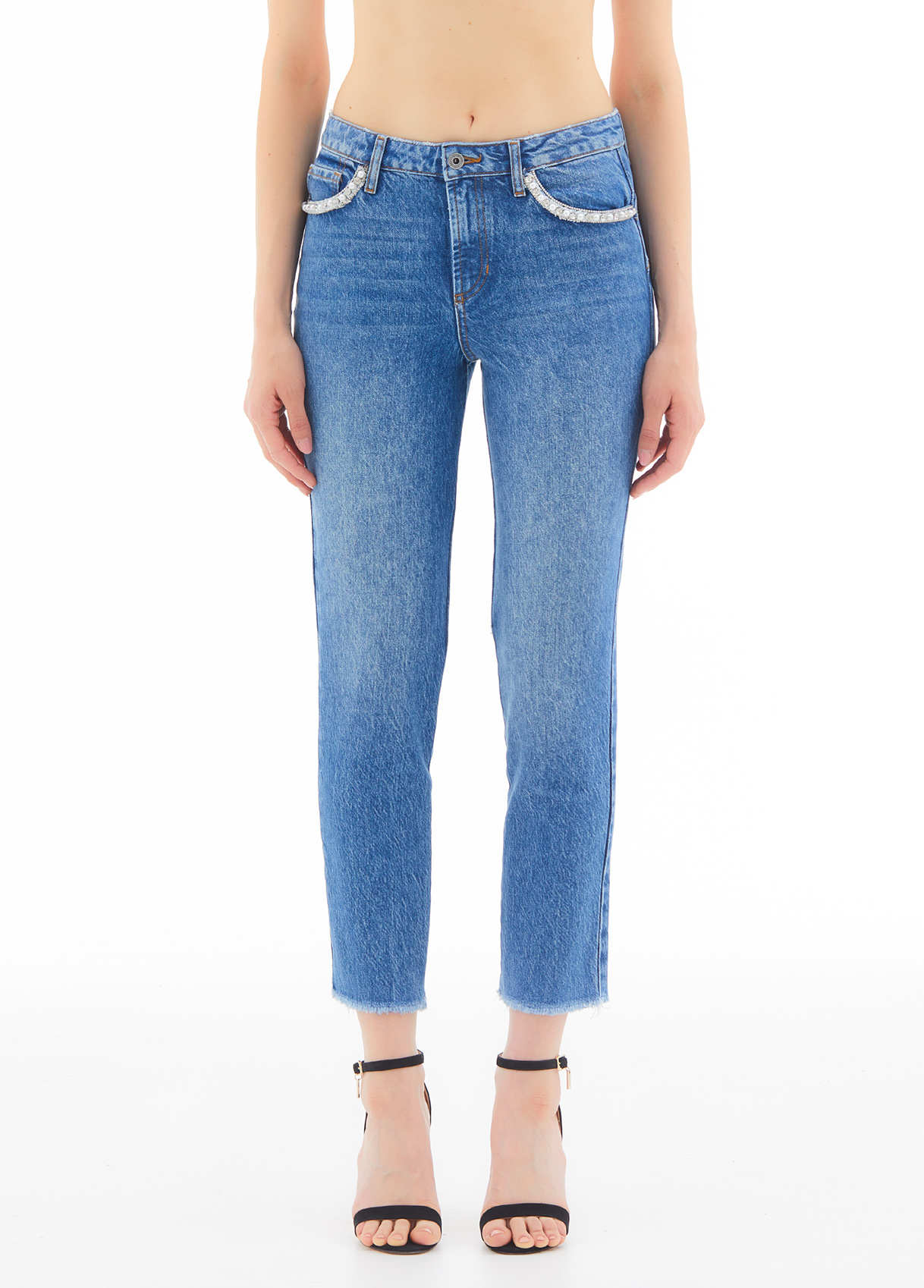 Eco-friendly jeans with appliqués